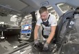 Audi production: working without backache with the exoskeleton