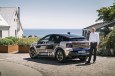 Michael Schurr in front of the Audi A2 e-tron with design livery